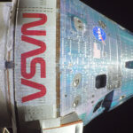The Orion spacecraft with NASA markings is seen en route to the moon on Artemis 2