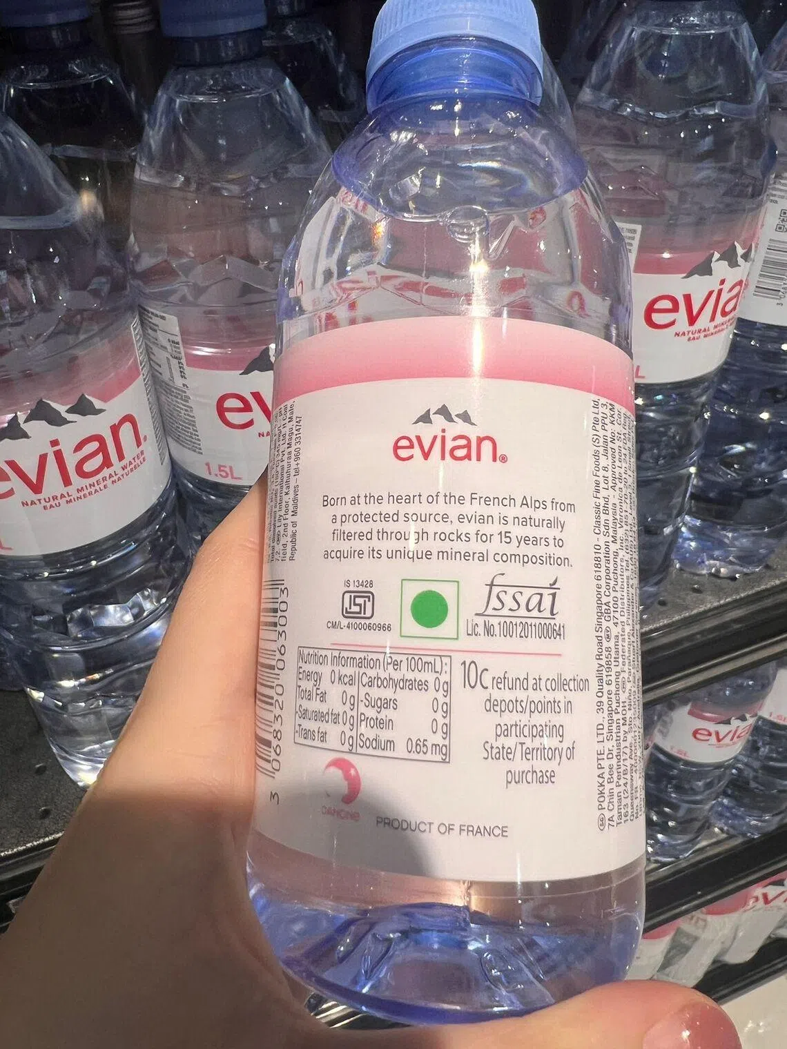 Evian bottle with 10 cent external logo, designed for overseas use purposes.