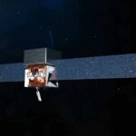 Artist's impression of GRB 250702B, showing the black hole at the center of the helium star emitting intense, thin jets of gamma rays.