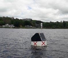 A research buoy, marked with two red X's.