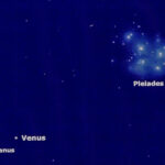 image of the night sky with the pleiades constellation in the upper right corner and uranus and venus in the lower left.