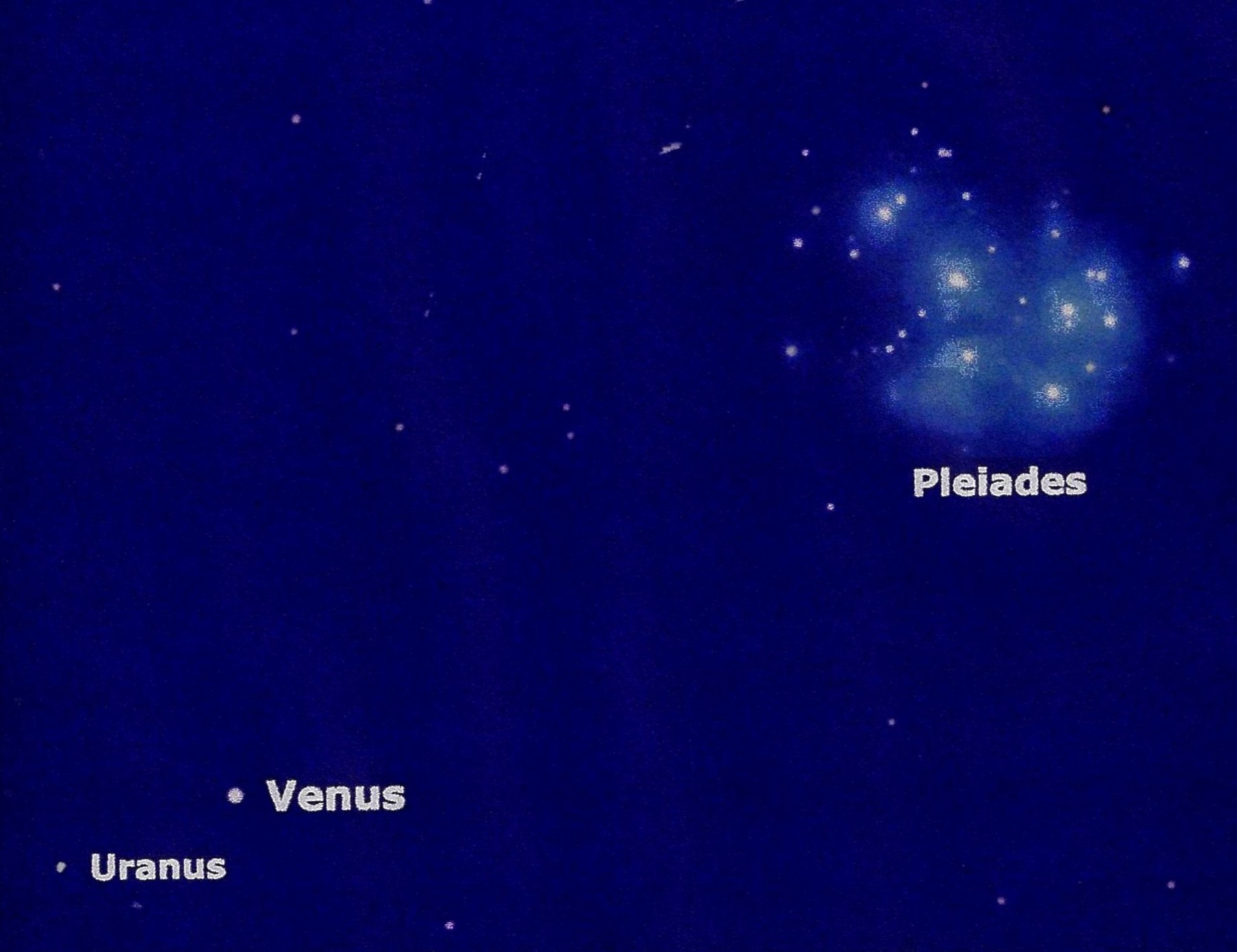 image of the night sky with the pleiades constellation in the upper right corner and uranus and venus in the lower left.